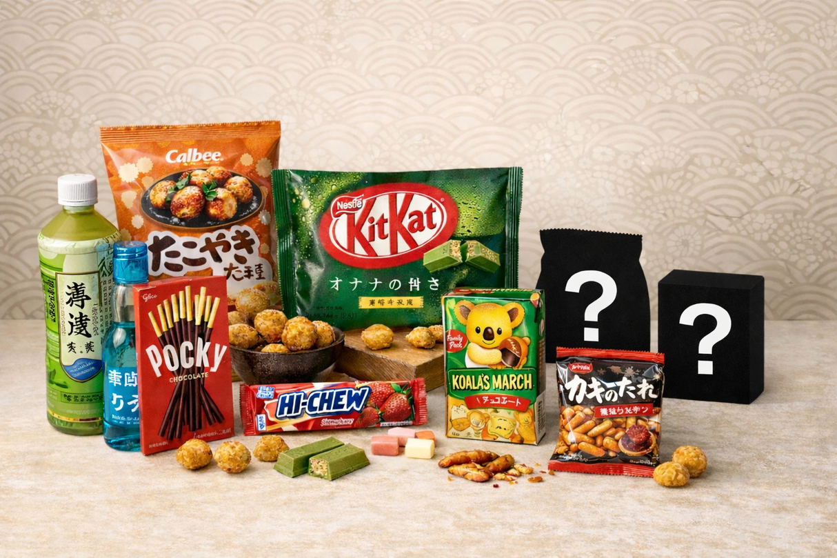 Calbee Takoyaki Ball Corn Puffs (orange bag, back left)
Nestlé KitKat Matcha (Green Tea) (large green bag, center back)
Lotte Koala’s March – Chocolate (Family Pack) (green box, back right)
Glico Pocky – Chocolate (red box, front left)
Morinaga Hi-Chew – Strawberry (red wrapper, front center)
RISKA Umaibo – Cheese flavor (yellow stick snack, front right)
Kaki no Tane Rice Crackers (small black/red bag, front right)
Loose snacks / props
Takoyaki balls in a small bowl
Individual takoyaki balls scatte